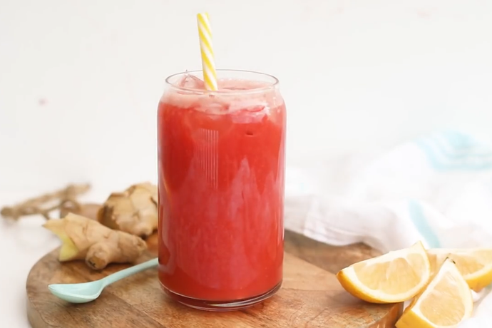 Watermelon lemonade with strawberries and ginger